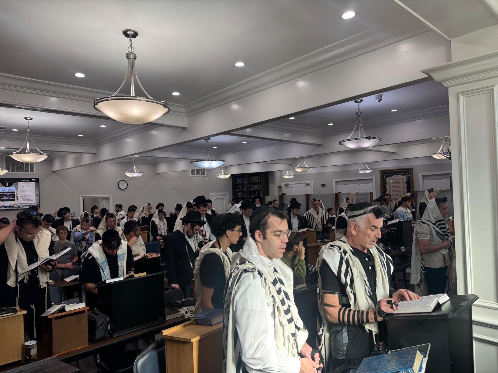 Bais Tefila davening with a full sanctuary